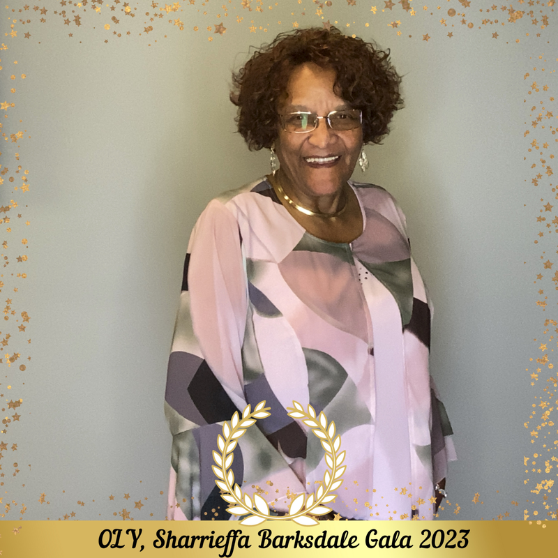 A supporter smiling in the gala 2023 photo booth